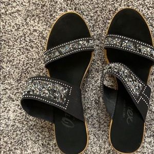 Black sequins shoes.
